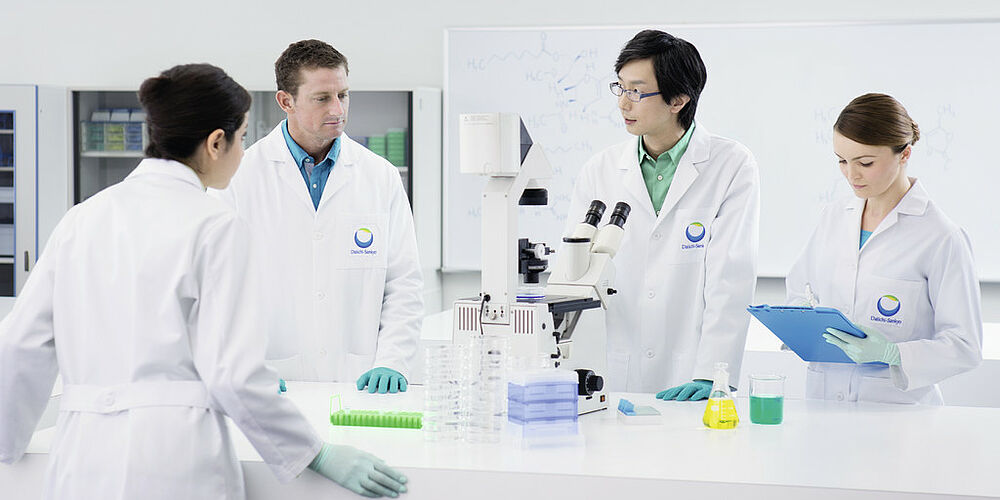 Two scientists in the lab Two scientists working in a laboratory, discussing their results.